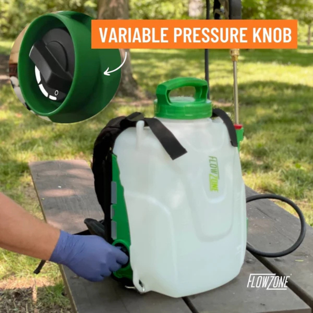 Rear view highlighting ComfortStraps backpack harness and battery compartment of the FlowZone Storm 2.5, ready for field use with wand holster.