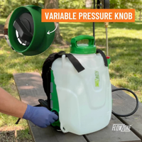 Rear view highlighting ComfortStraps backpack harness and battery compartment of the FlowZone Storm 2.5, ready for field use with wand holster.