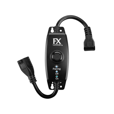 Front view of FX Luminaire Wi‑Fi Plug showing compact IP66-rated enclosure, status LEDs, and connection port for landscape lighting systems.