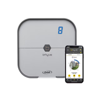 Orbit B-hyve 8-station indoor irrigation controller front view showing terminal layout, digital interface, and gray wall-mount enclosure.